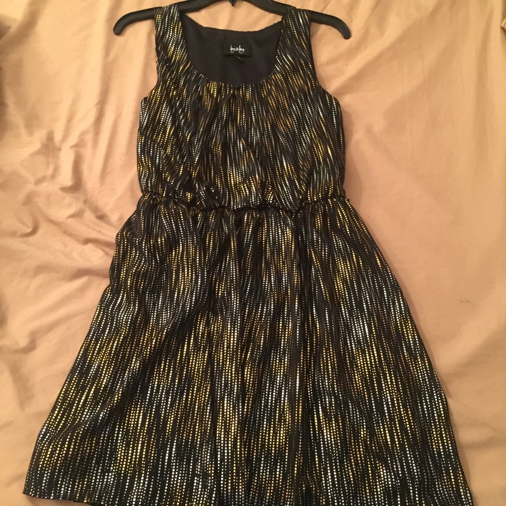 Black dress with gold and silver accents